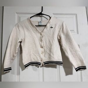 Cream Lacoste cardigan, fits like a Child 5X could be worn as petite womans crop